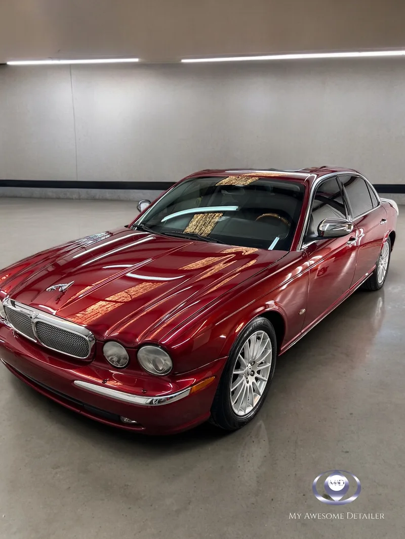 Red Jaguar XJ rear quarter